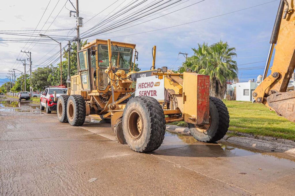 Máquina de construcción estacionada para iniciar obras